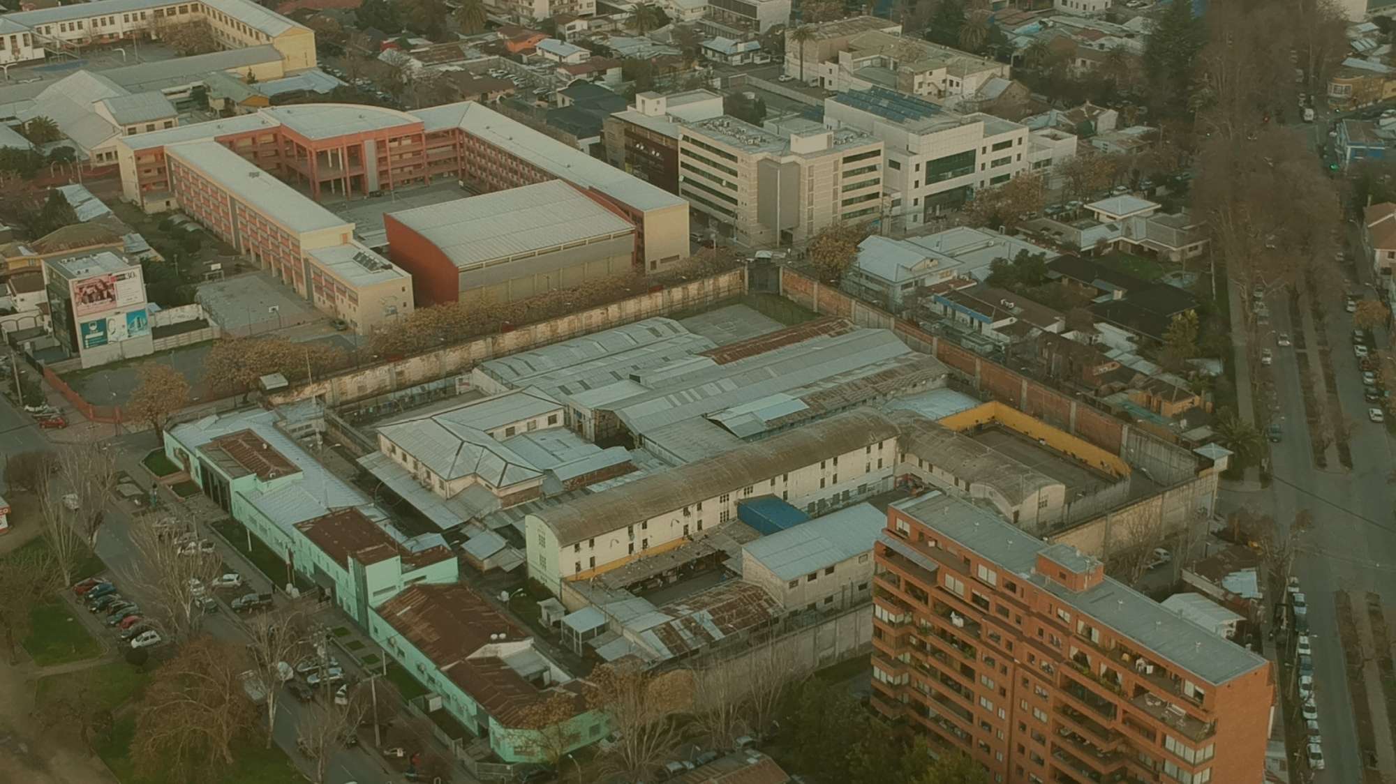 Aerial view of the former prison site before its transformation into a contemporary civic center.