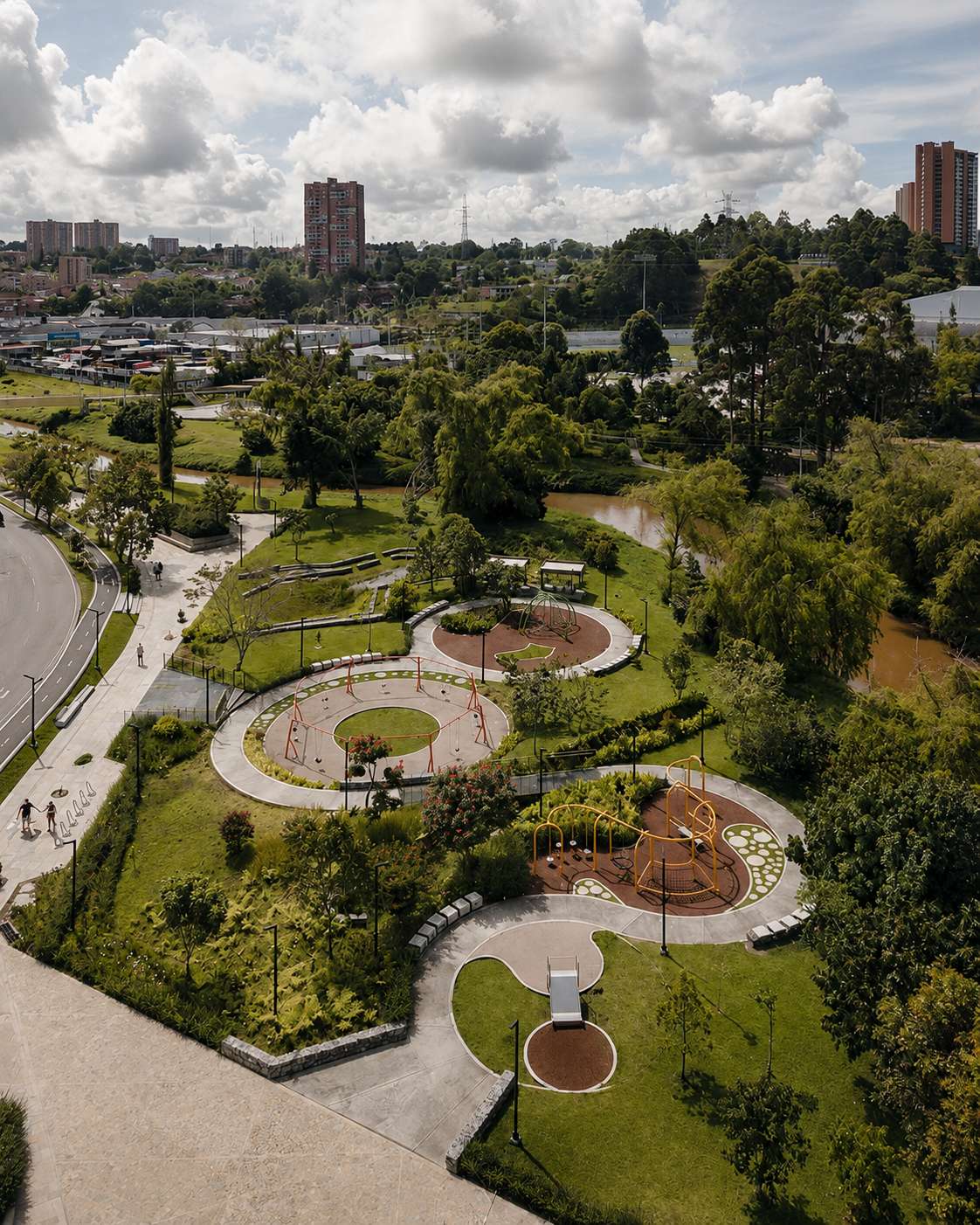 Aerial view of a therapeutic landscape connecting remembrance gardens, recreational spaces and the natural river corridor.